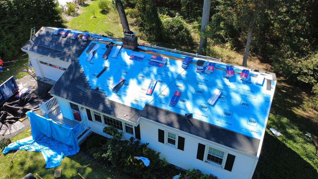 Large roof mid-replacement with synthetic underlayment